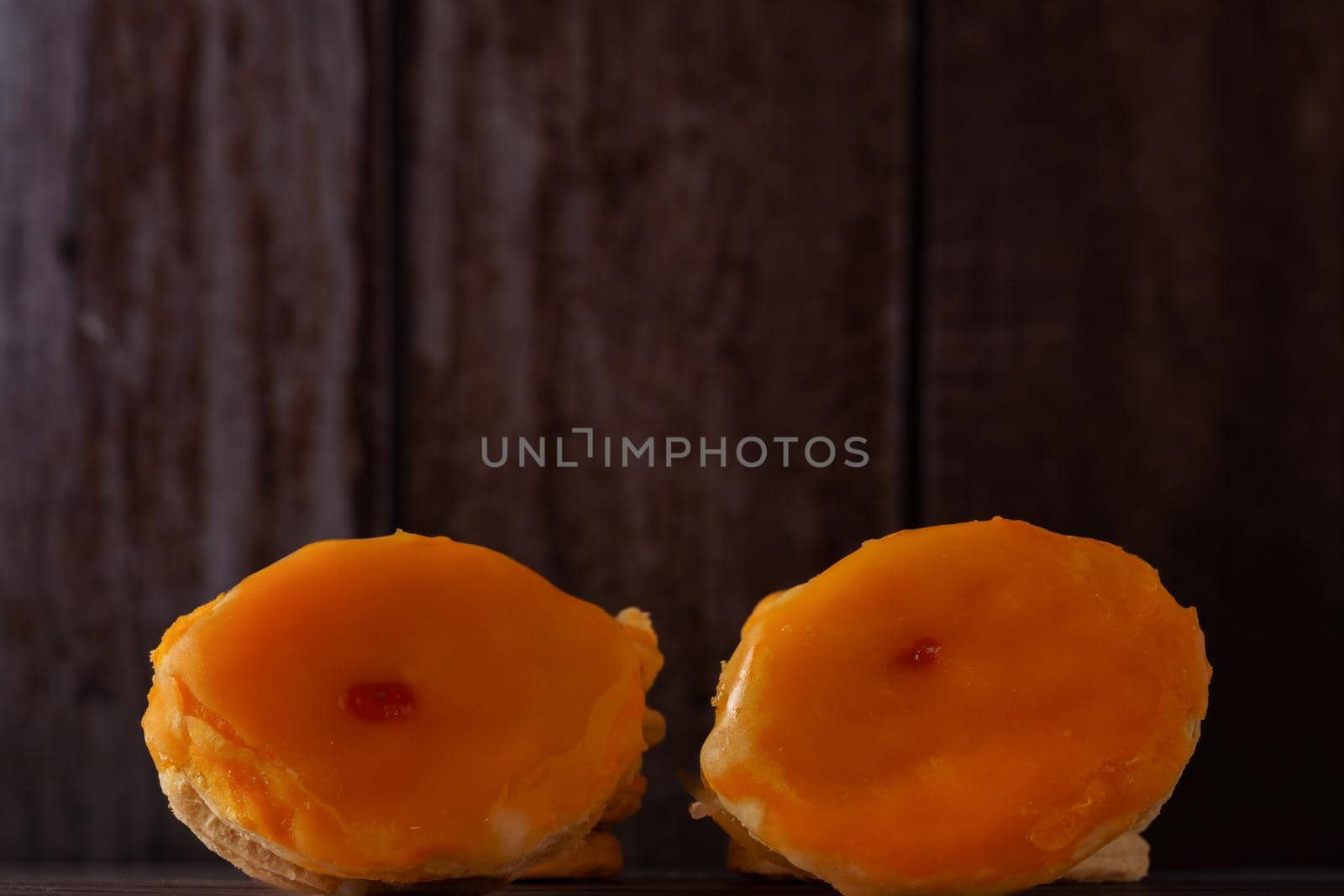 tortas locas or crazy cakes typical from andalucia, spain isolated on a wood background