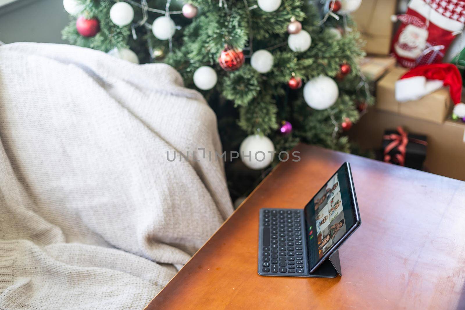 Weekend homely scene. Tablet pc with film, watching winter movies by Andelov13