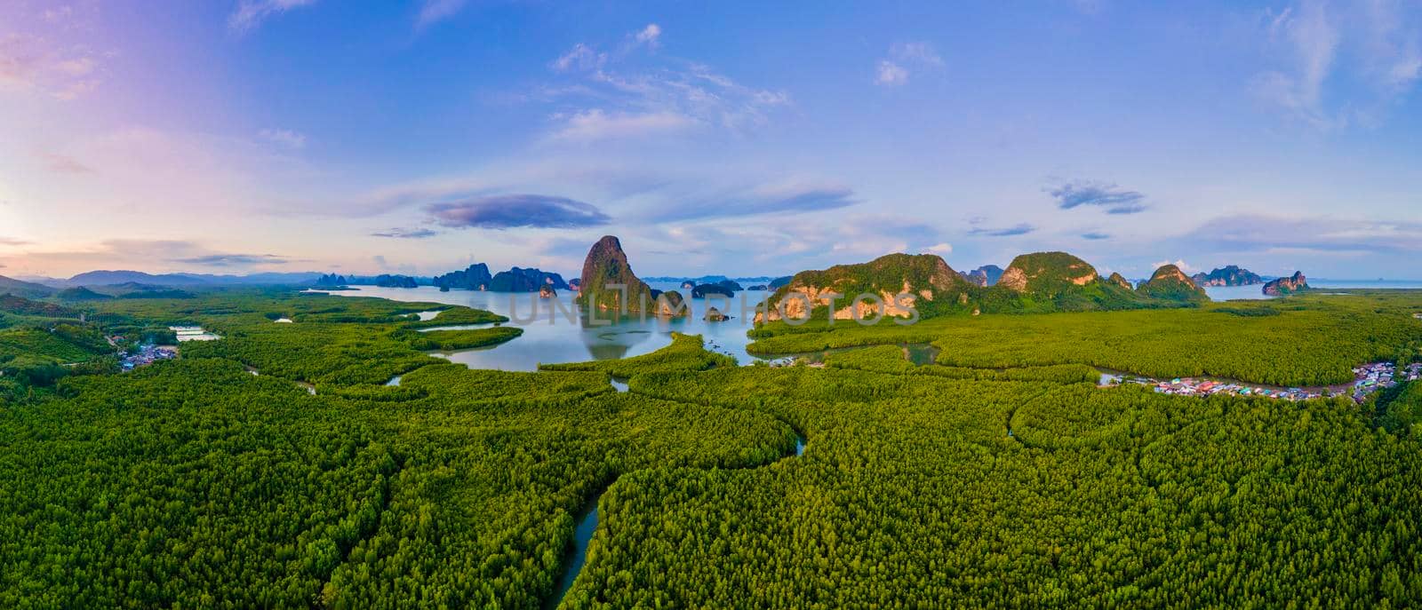 panorama view of Sametnangshe, view of mountains in Phangnga bay with mangrove forest in andaman sea with evening twilight sky, travel destination in Phangnga, Thailand