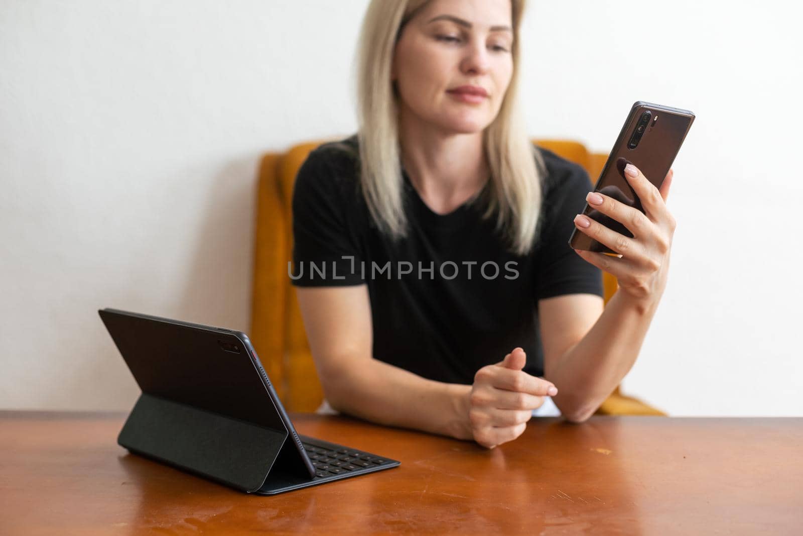 Businesswoman using tablet computer. working place by Andelov13