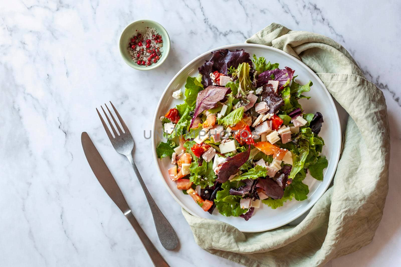 bacon, tomato, cheese and bell pepper salad, top view, copy space