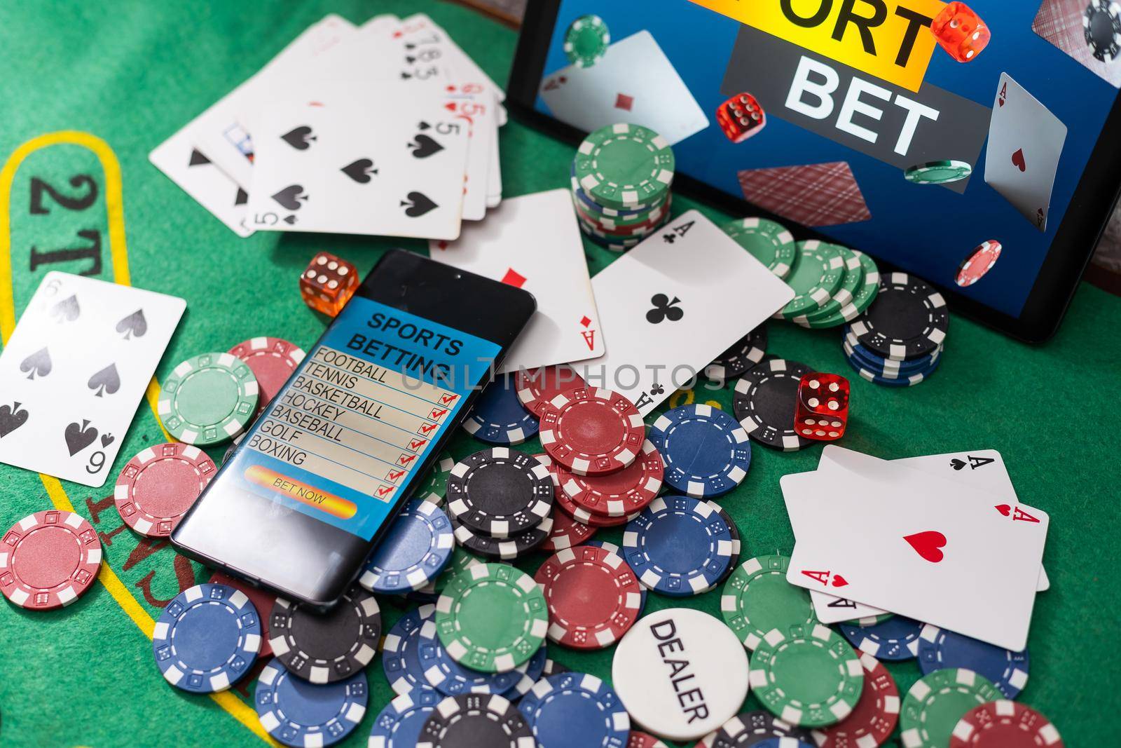 Gambling online casino Internet betting concept green screen. smartphone with poker chips, dice. Jackpot, casino chips