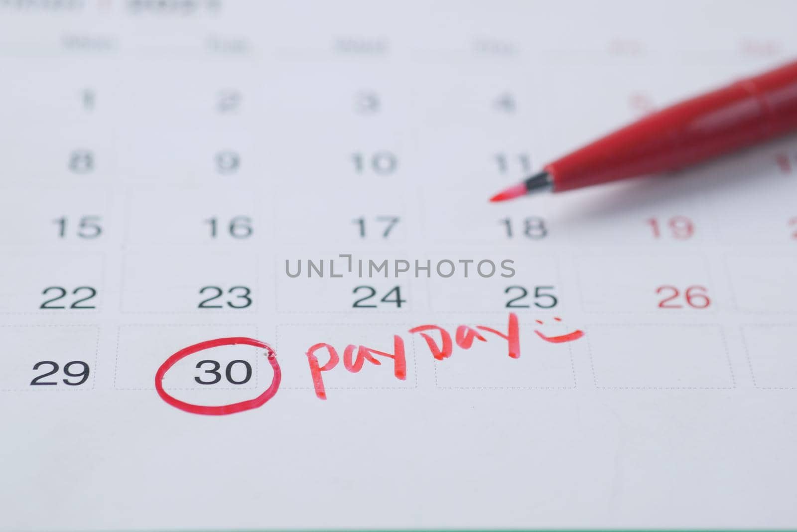 payday concept with marking on a calendar date