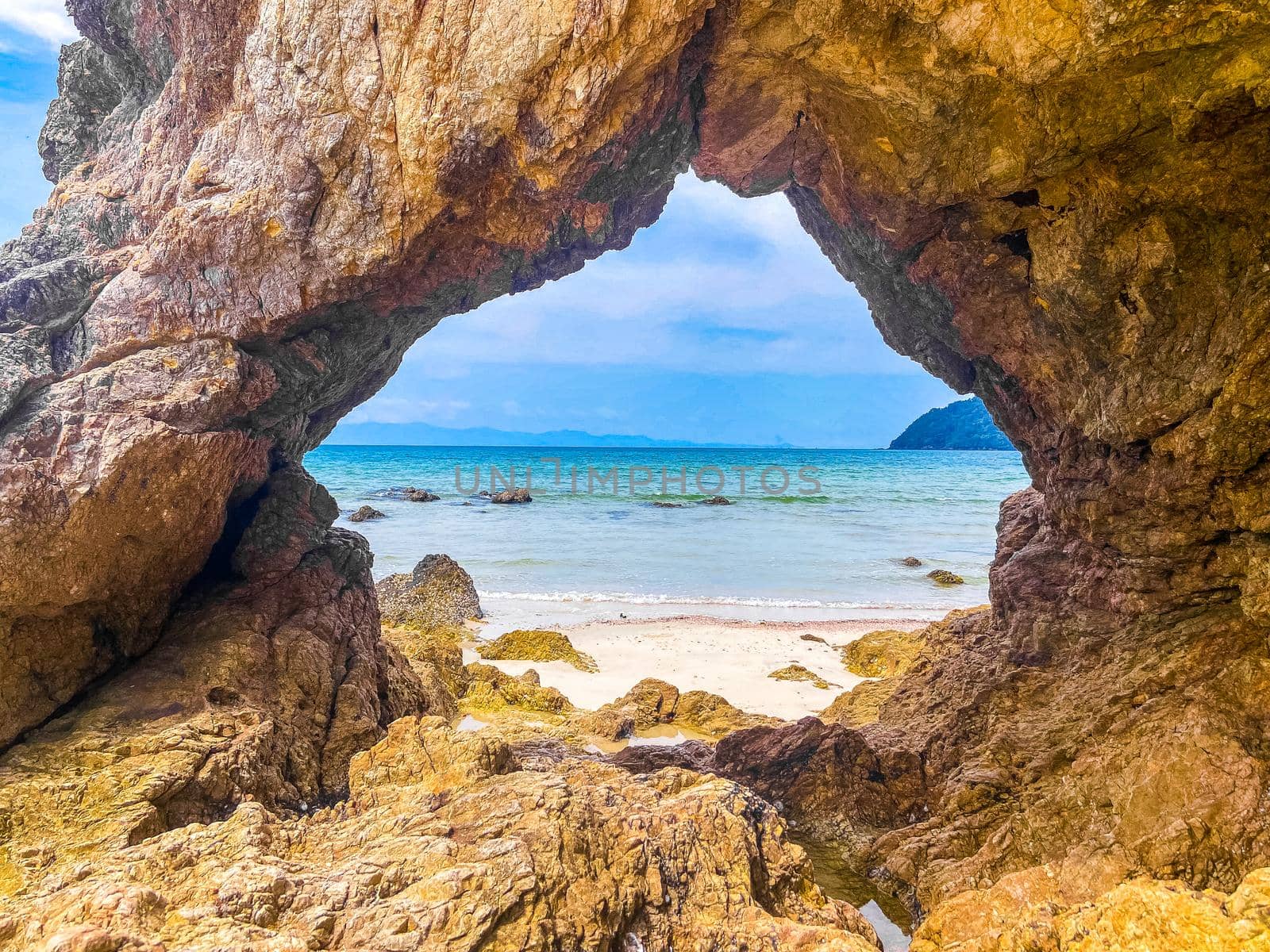 Koh Phayam beach Hin Talu with rock arch formation in Ranong, Thailand. by worldpitou