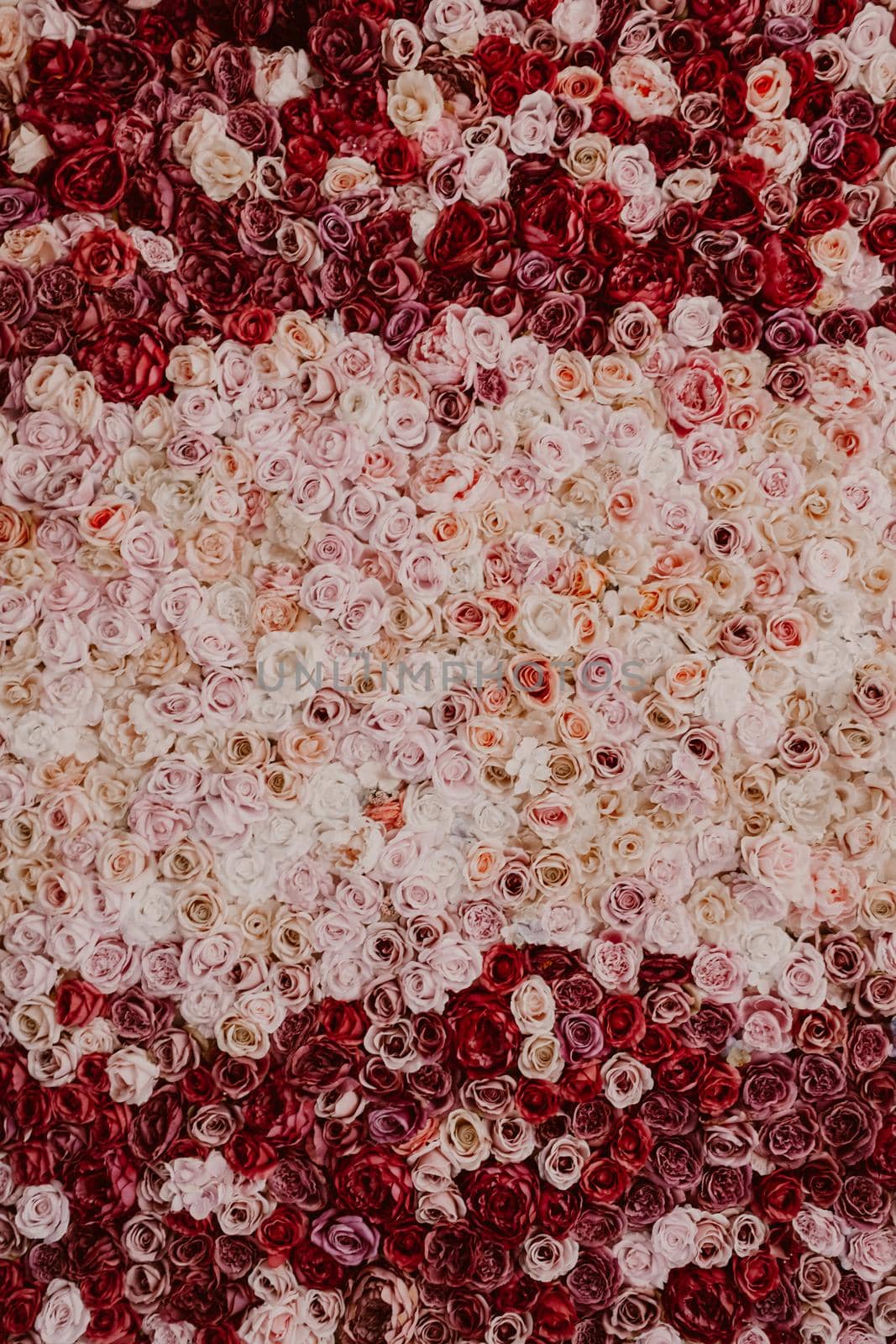 Amazing roses background. Million flowers in pink, red and white colors. Wedding decoration. Artificials, perfect for mock-up projects, design by kristina_kokhanova