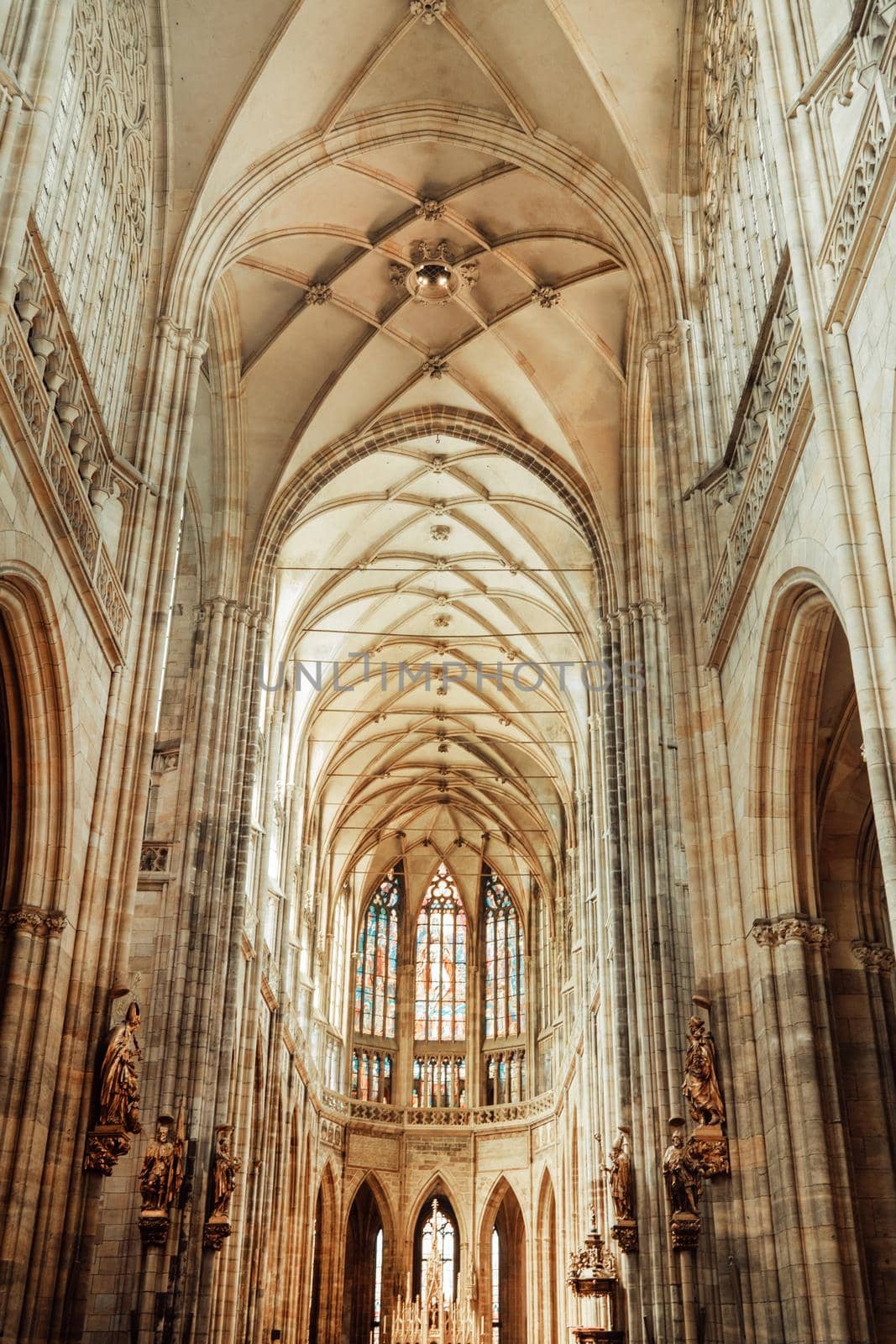 Prague, Czech Republic - July 2022. Dome in St. Vitus Cathedral. Grand interior, gothic ornamental details of roof inside. High ceiling, most famous church in Castle. . High quality photo