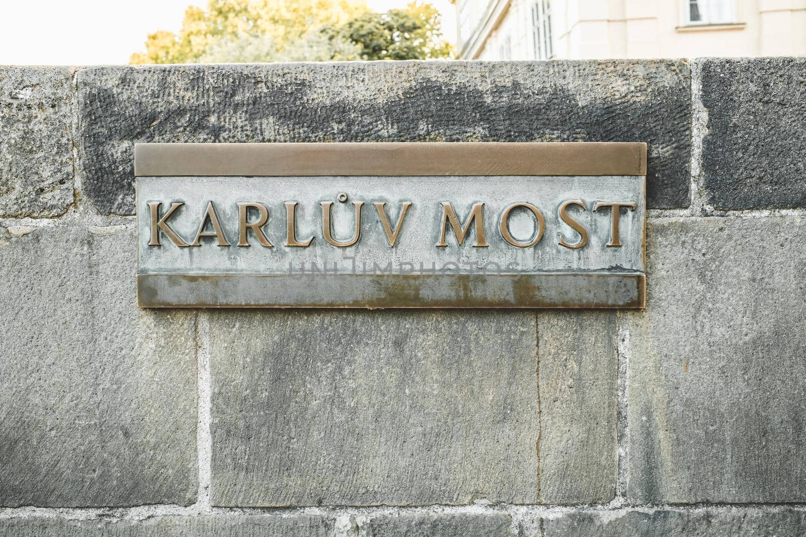 Brass name sign of Karluv Most - Charles bridge in Prague, Czech Republic. High quality photo
