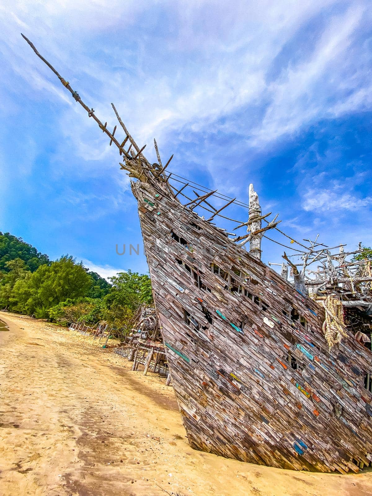 Old wooden pirate boat on the beach in Koh Phayam, Ranong, Thailand, south east asia