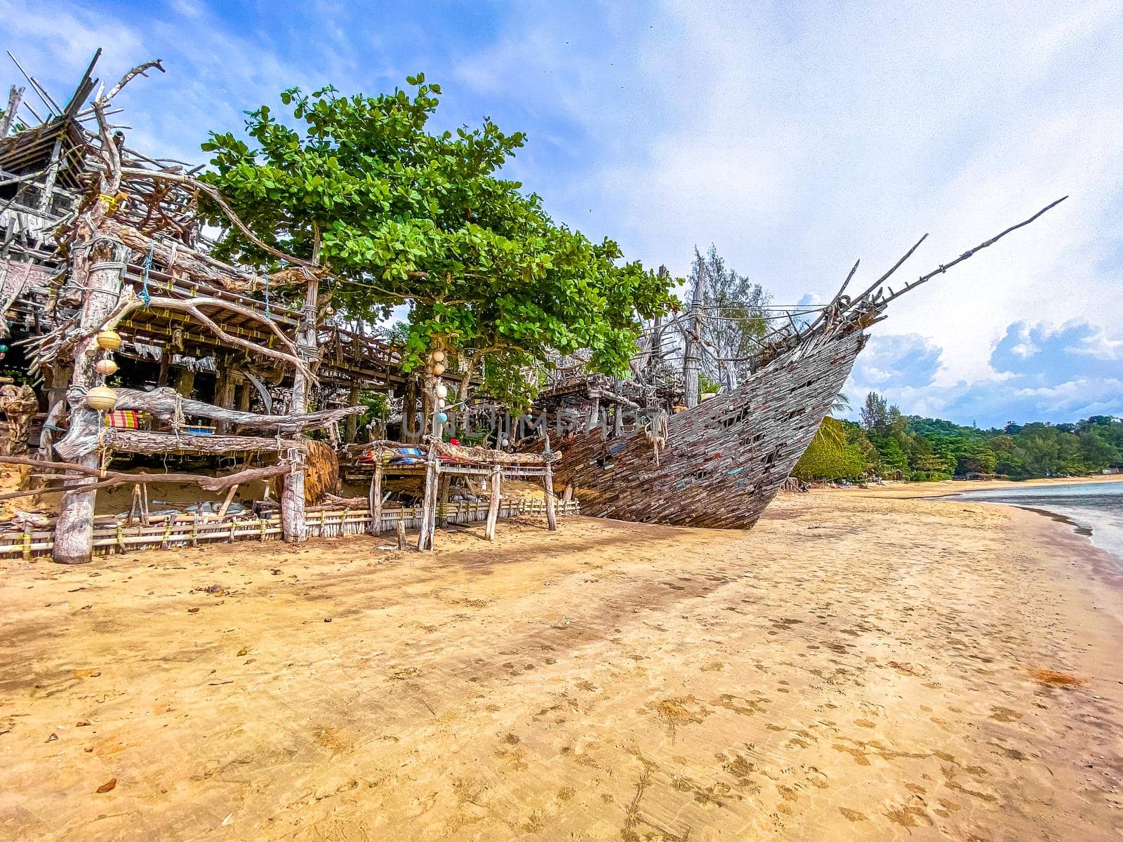 Old wooden pirate boat on the beach in Koh Phayam, Ranong, Thailand, south east asia