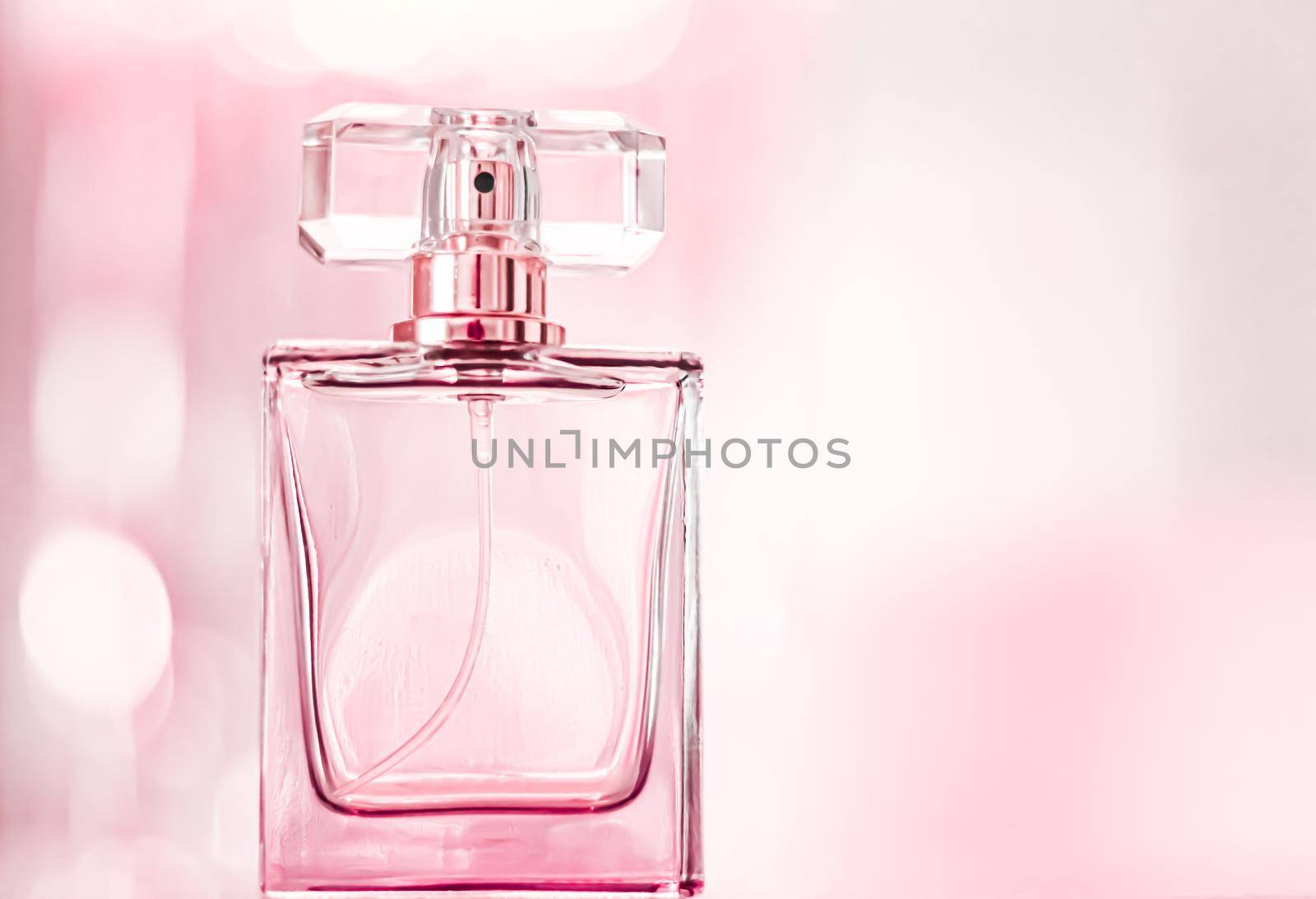 Perfume bottle on glamour background, floral feminine scent, fragrance and eau de parfum as luxury holiday gift, cosmetic and beauty brand present concept