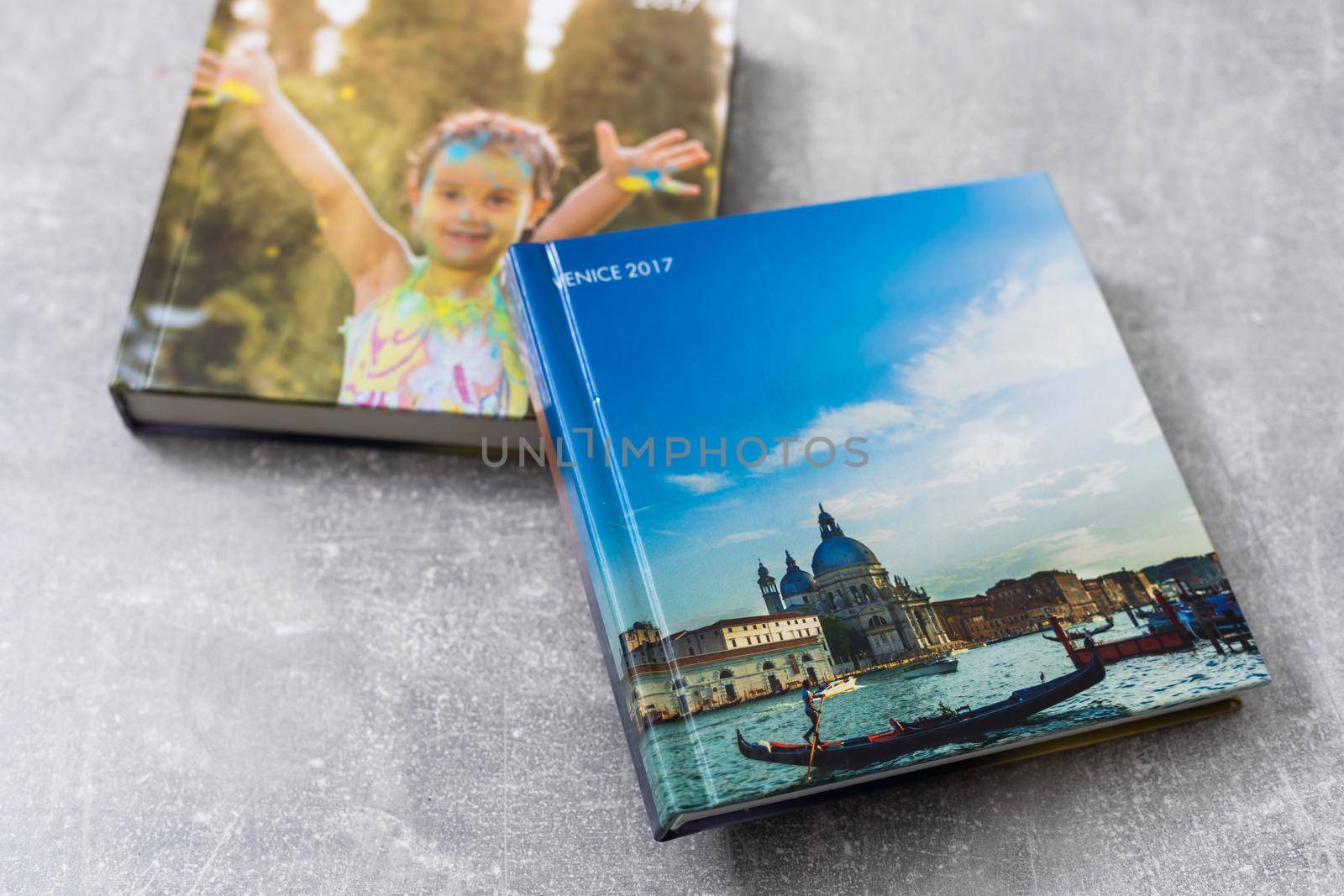 Photobook Album with Travel Photo on Table.