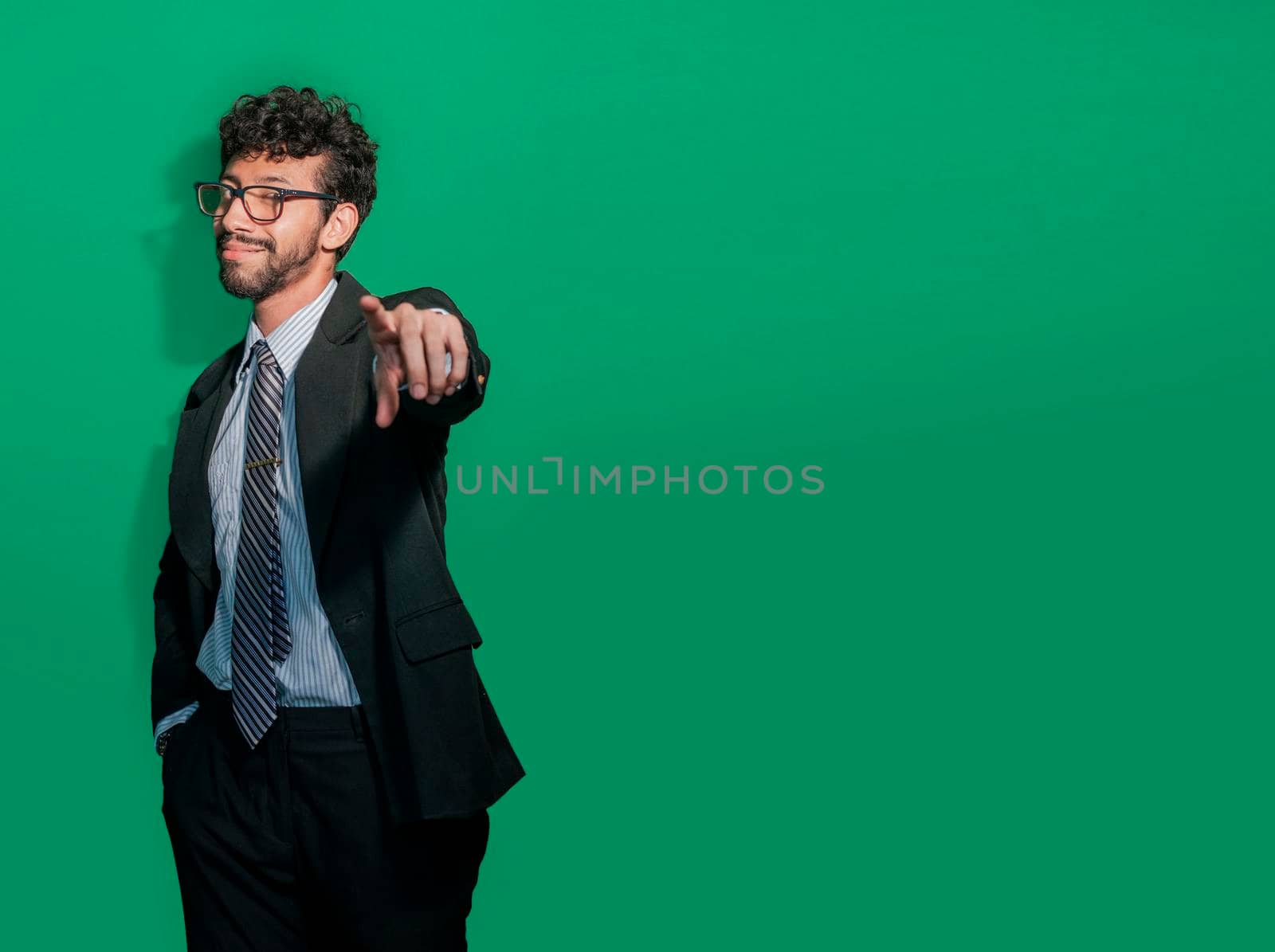 Young businessman with positive attitude pointing at me, Friendly smiling business man pointing at you, Positive business people pointing at camera