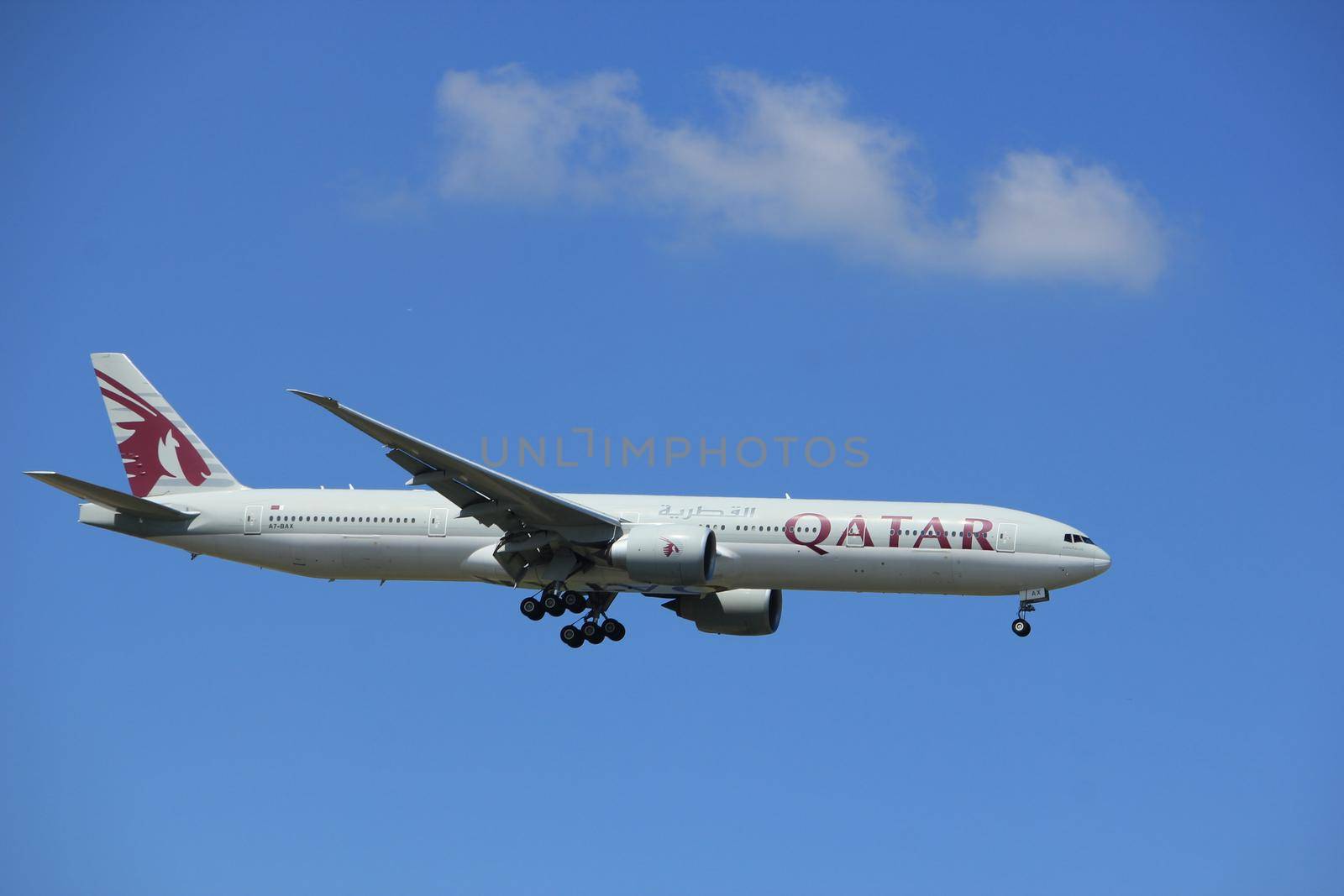 Amsterdam the Netherlands - July 9th 2017: A7-BAX Qatar Airways Boeing 777-300 approaching Schiphol Amsterdam Airport Kaagbaan runway