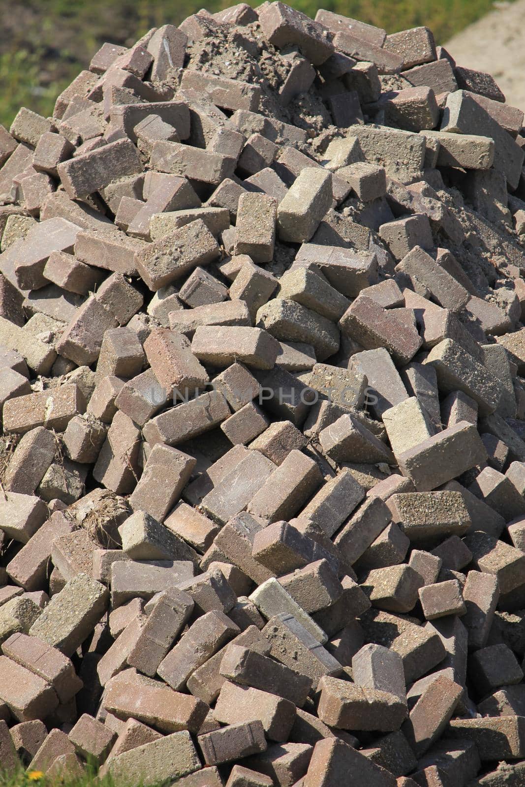Pile of red bricks on construction site