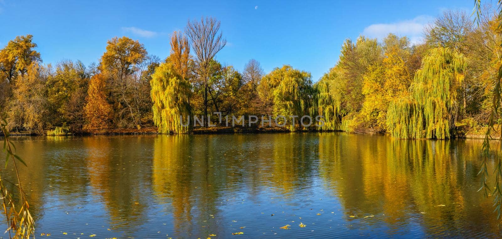 Upper Pond and Anti Circe Island in the Sofievsky arboretum or Sofiyivsky Park in Uman, Ukraine, on a sunny autumn day