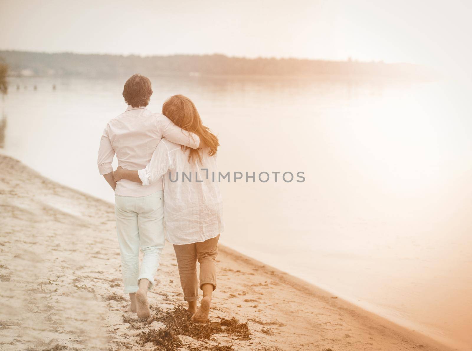 Couple walk sea, great design for any purposes. Healthy active lifestyle. Elderly couple. Blue sky. Elderly people by LipikStockMedia