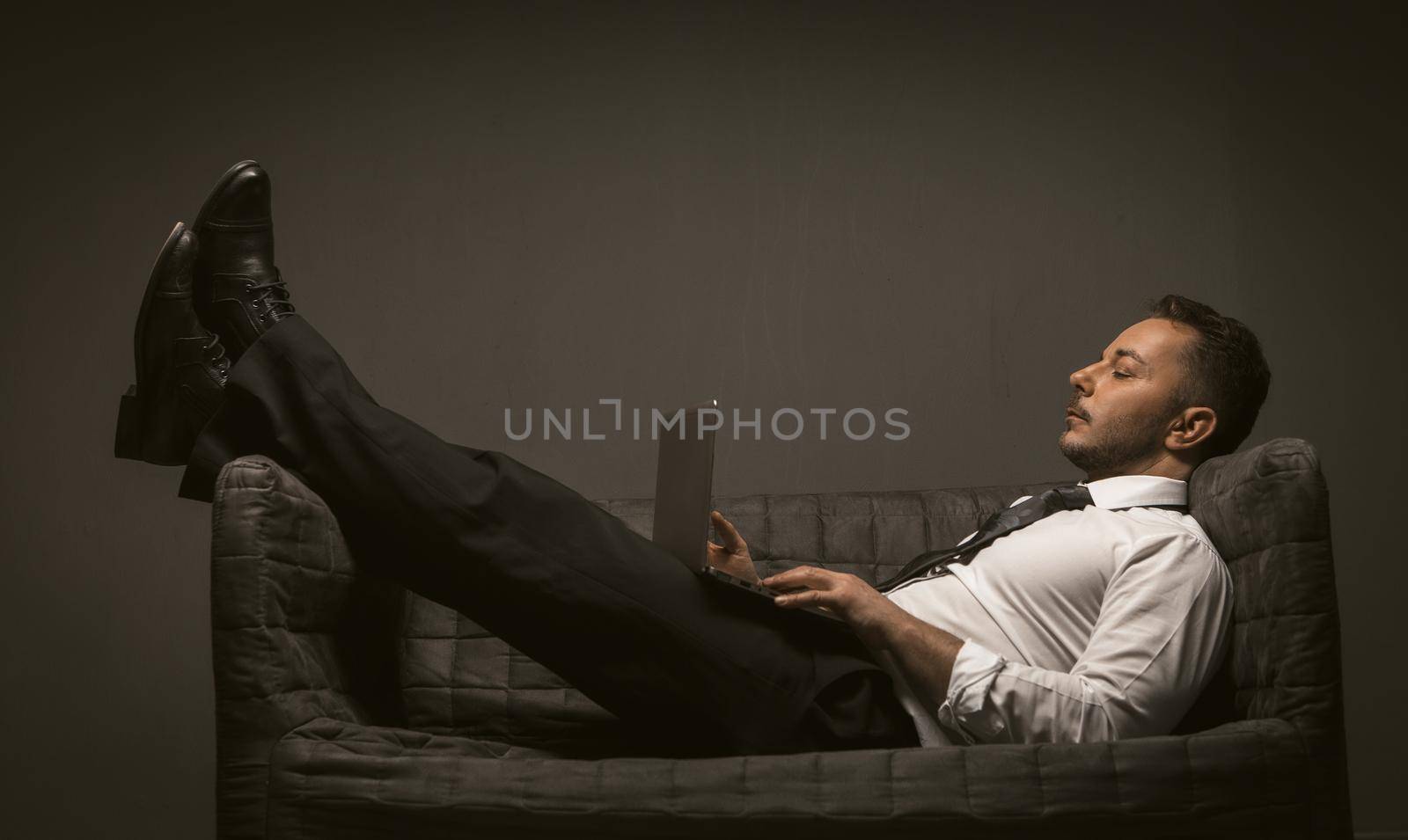 Modern portrait of boss businessman for lifestyle design. Business background. Home office workplace. Comfortable workplace. Business person. Modern office interior by LipikStockMedia