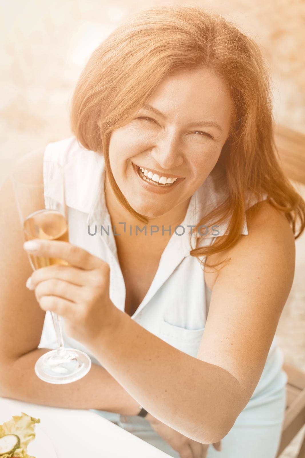 Woman smile happy with wineglass, great design for any purposes. Beauty face by LipikStockMedia