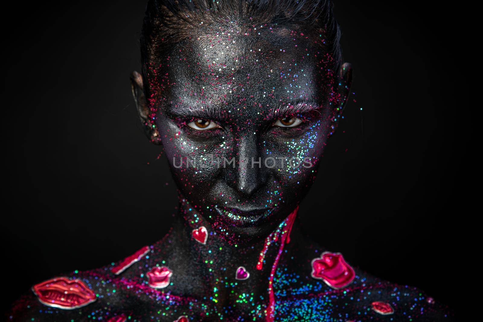 Mystical makeup of a woman in the dark by Multipedia