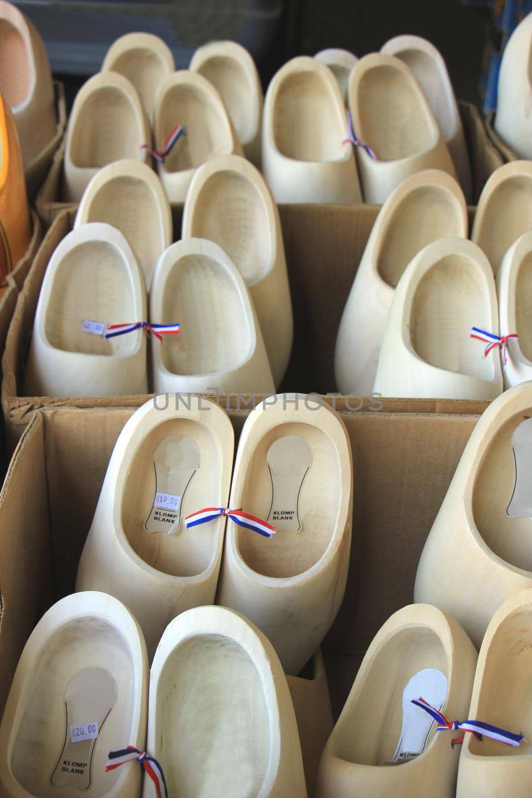 Dutch wooden clogs at a market stall, traditional shoes