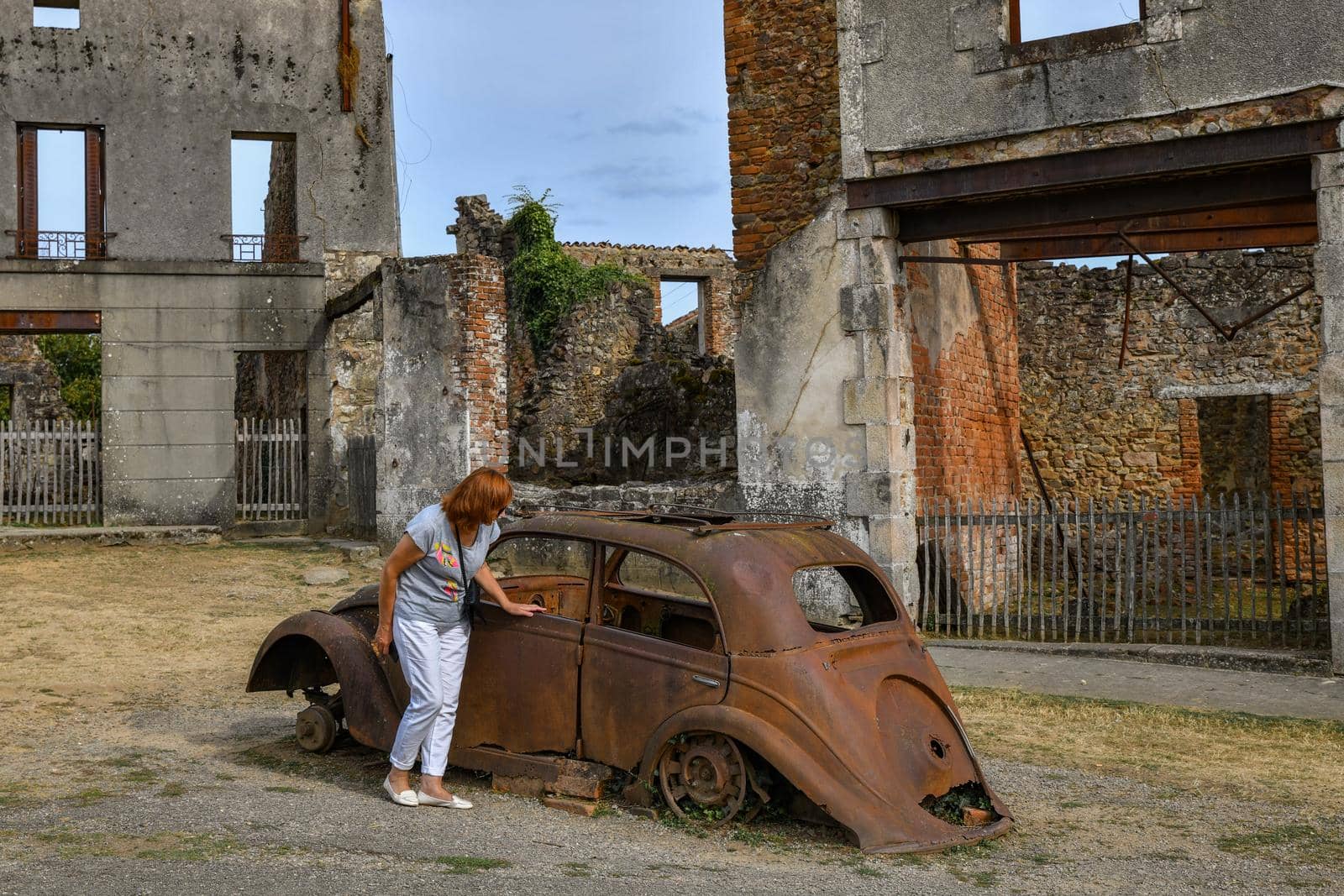 Destroyed cars and buildings during World War 2 in Oradour sur Glane France