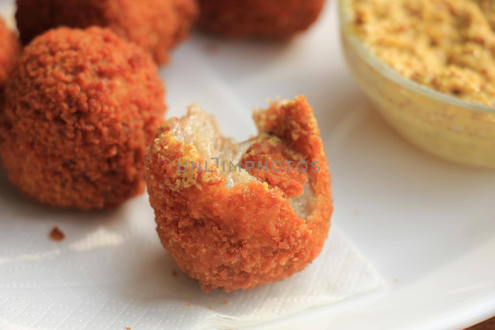 Bitterballen with mustard, warm fried snack, served in the Netherlands