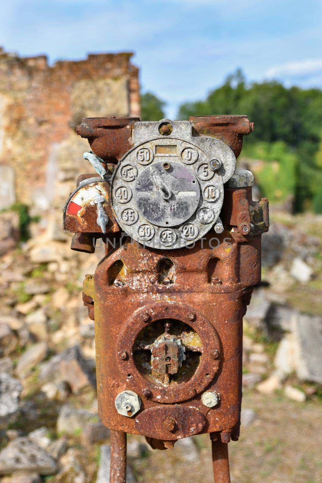 Old Gas Pump in the city Oradour sur Glane France