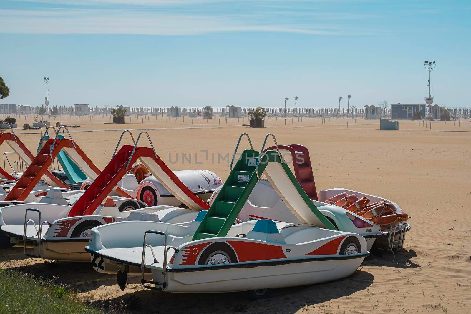 catamarans with an entertaining slide on the beach. Italy