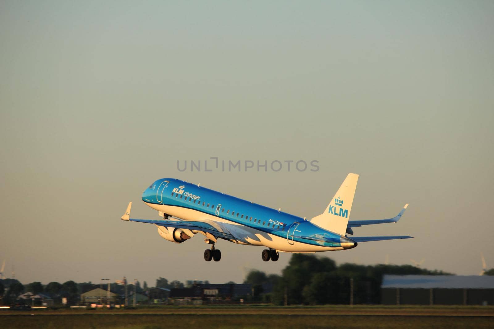 Amsterdam, the Netherlands  -  June 2nd, 2017: PH-EZB KLM Cityhopper Embraer ERJ-190STD taking off from Polderbaan Runway Amsterdam Airport Schiphol