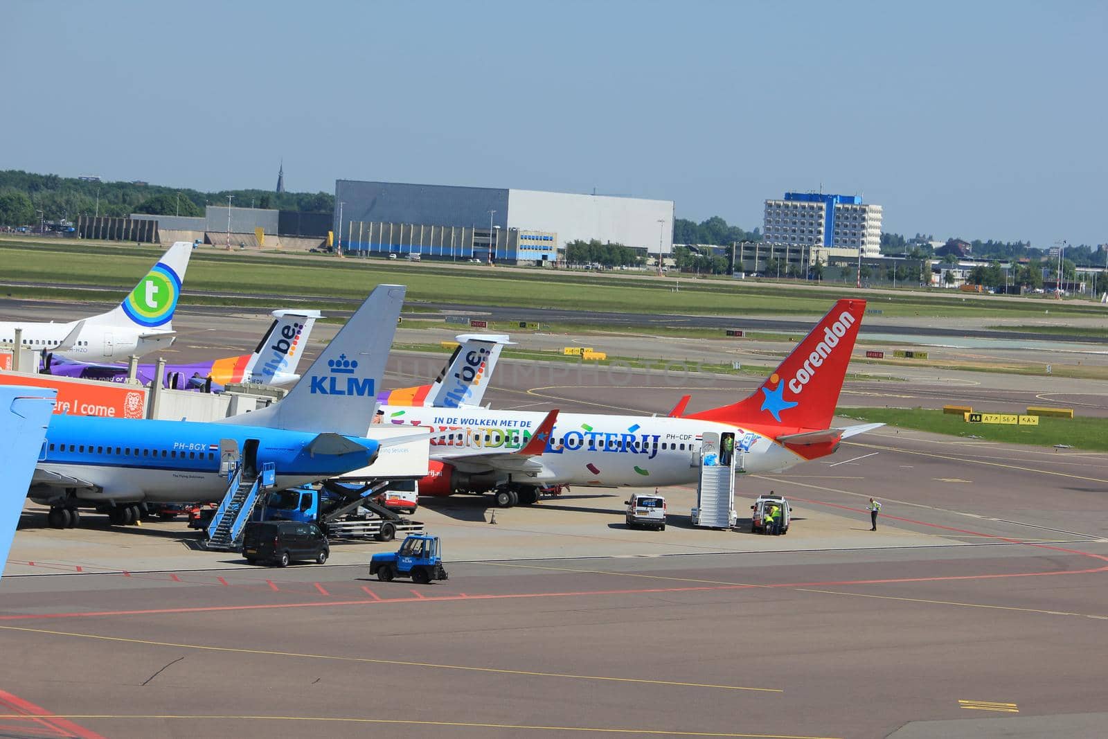 Amsterdam The Netherlands -  May 26th 2017: various airlines parked at gate at Schiphol International Airport