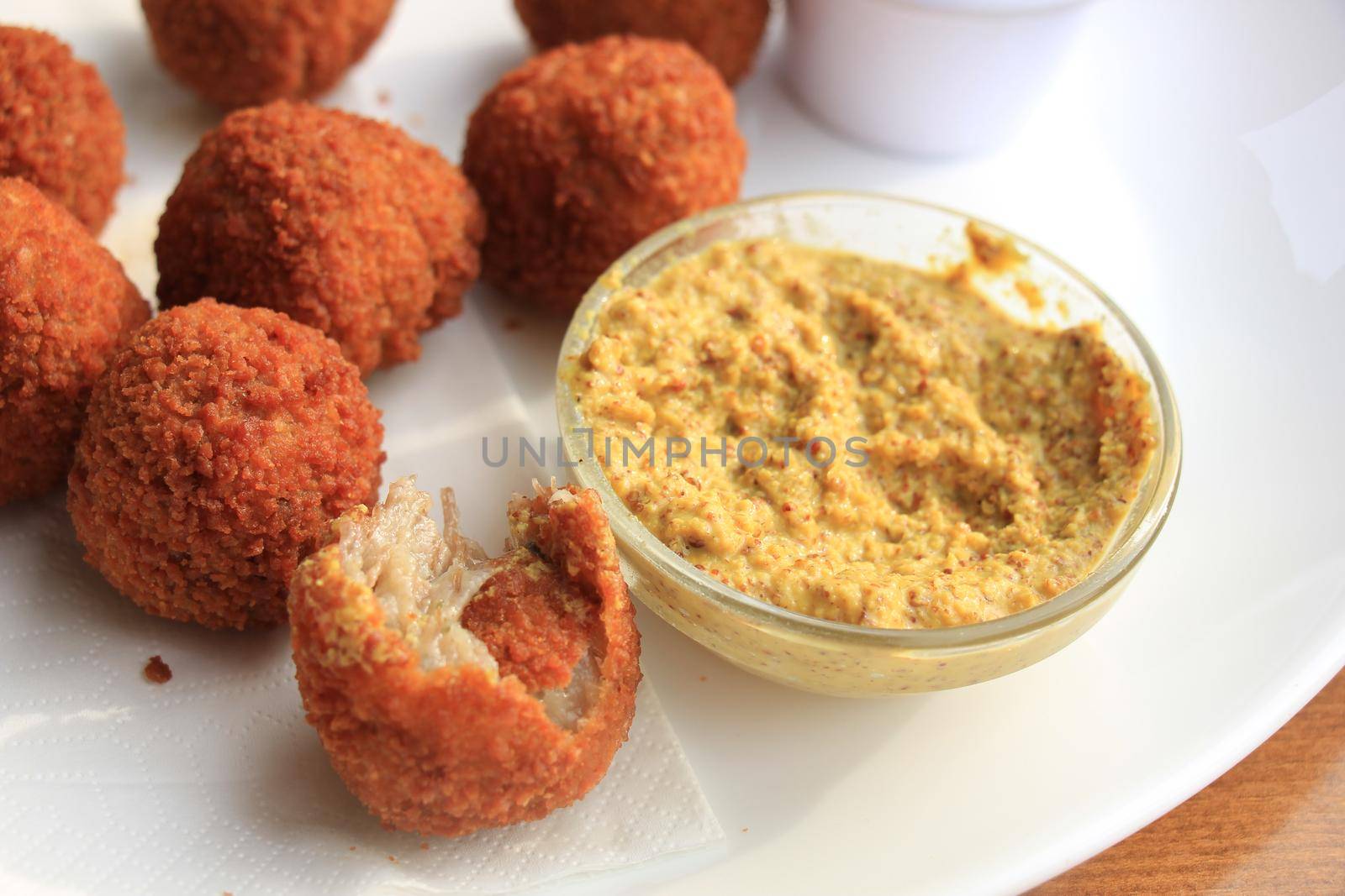 Bitterballen with mustard, warm fried snack, served in the Netherlands