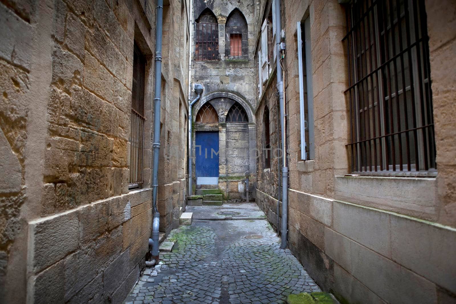Facade of an old church in a street of Bordeaux, France