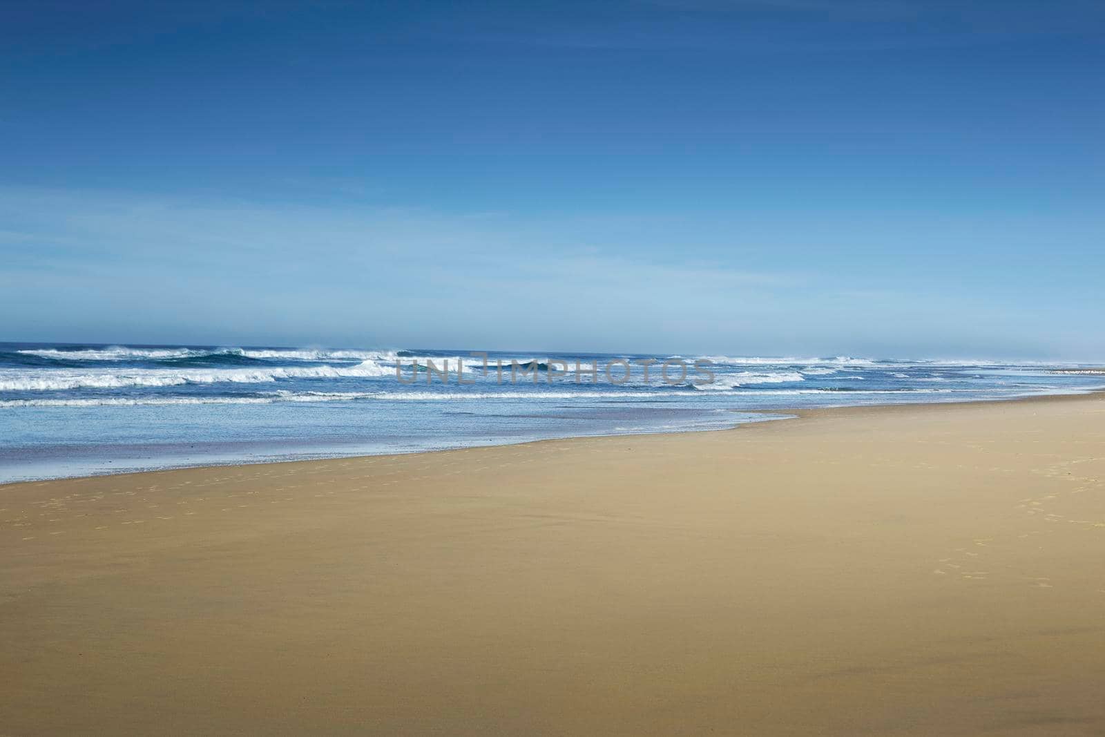 Beach and waves of Atlantic Ocean near Bordeaux, France