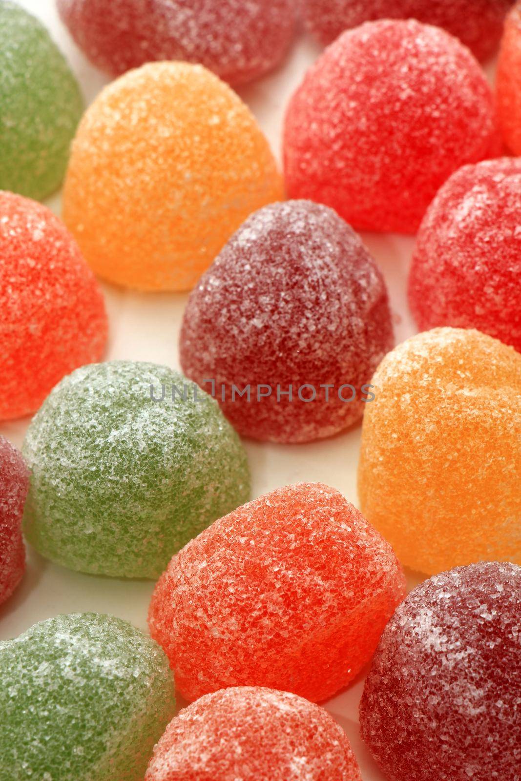 Sugared fruit candy in different shapes, colors and sizes