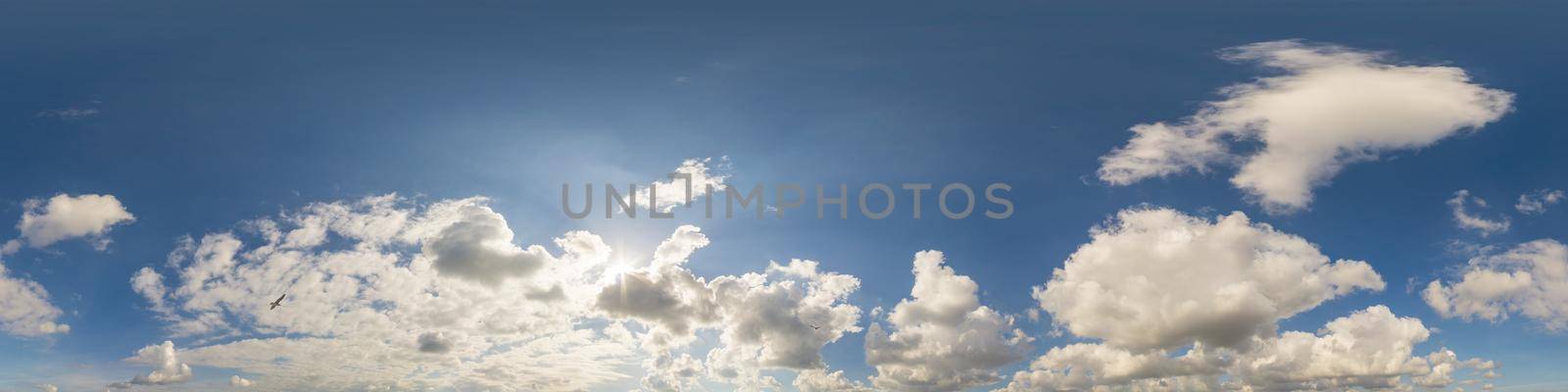 Blue sky panorama with puffy Cumulus clouds. Seamless hdr pano in spherical equirectangular format. Sky dome or zenith for 3D visualization, game and sky replacement for aerial drone 360 panoramas. by Matiunina