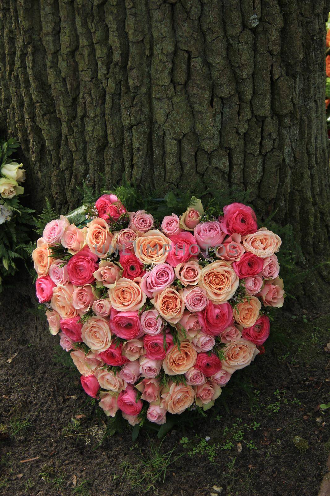 Heart shaped sympathy flowers by studioportosabbia