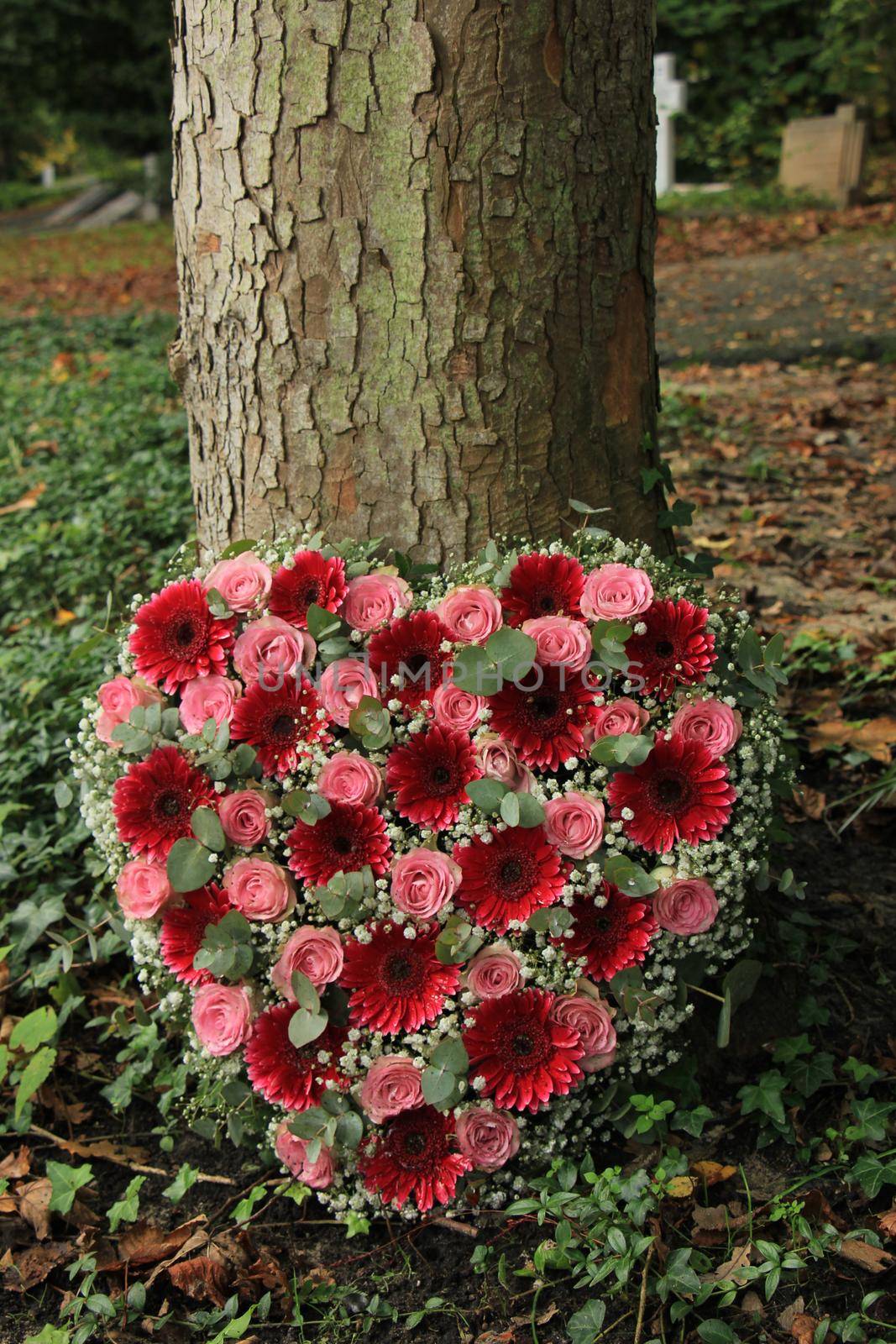 Heart shaped sympathy flowers by studioportosabbia