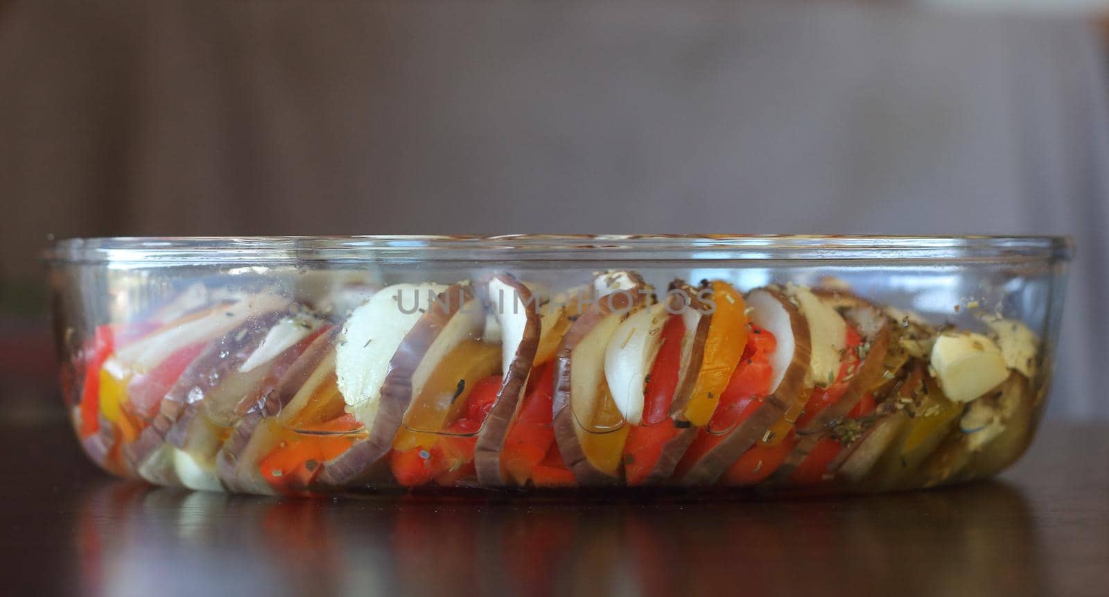 Glass baking form with vegetable ratatouille preparation by lanych