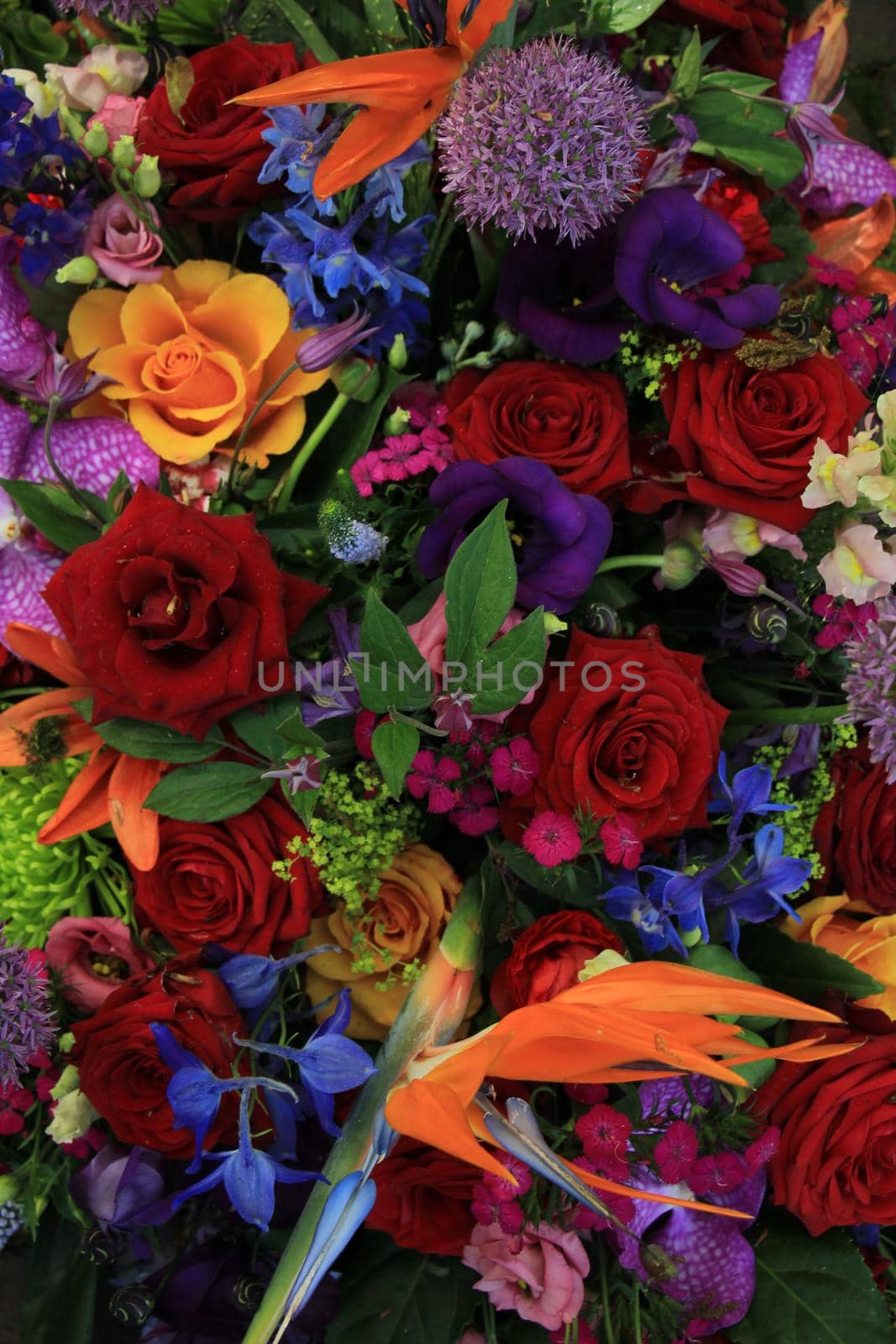 Mixed flower arrangement: various flowers in different colors for a wedding