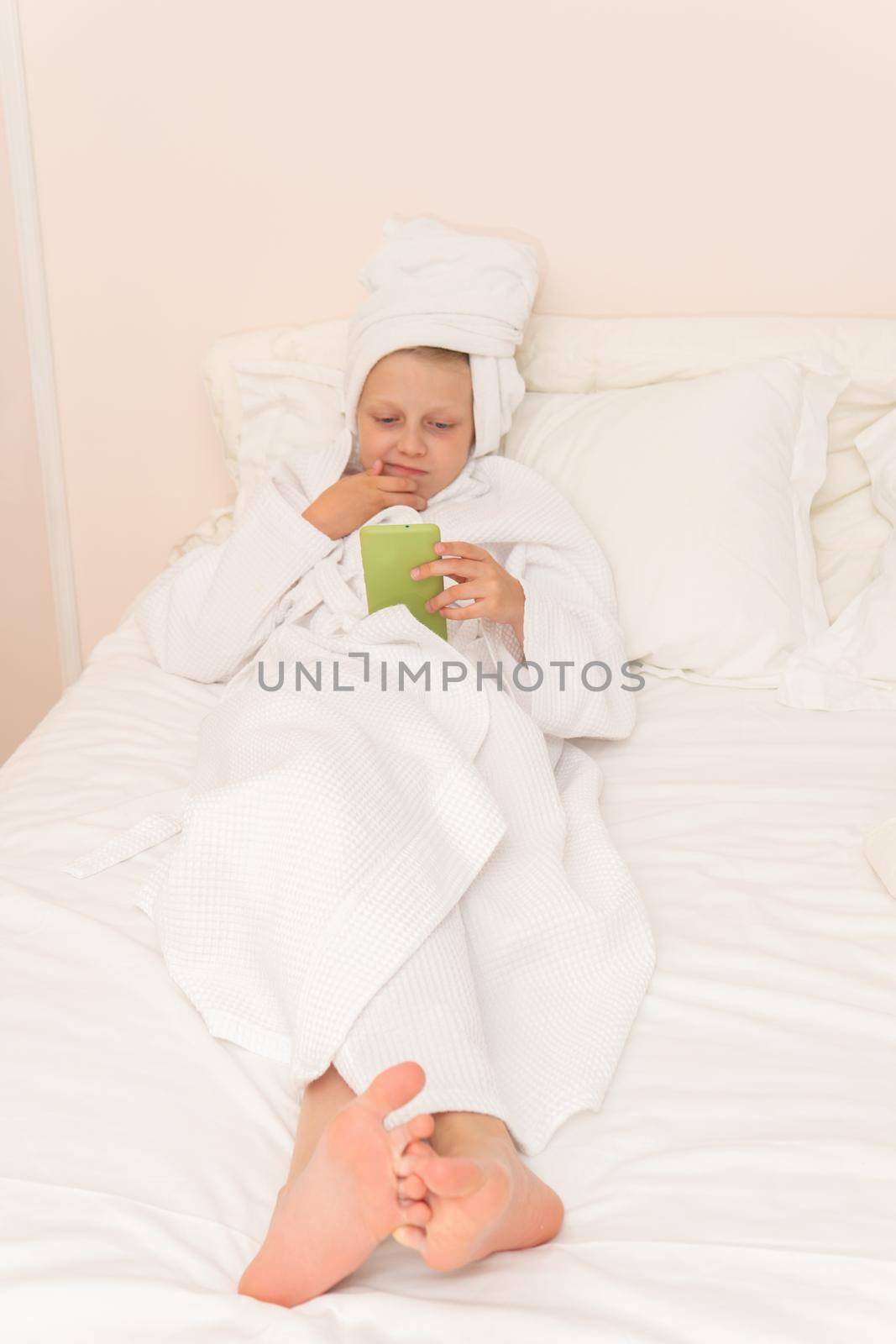 Bathrobe cute portrait girl cell white hygiene morning bathroom lifestyle, concept hotel happy for beauty and bed towel, background face. Hair funny fashion,