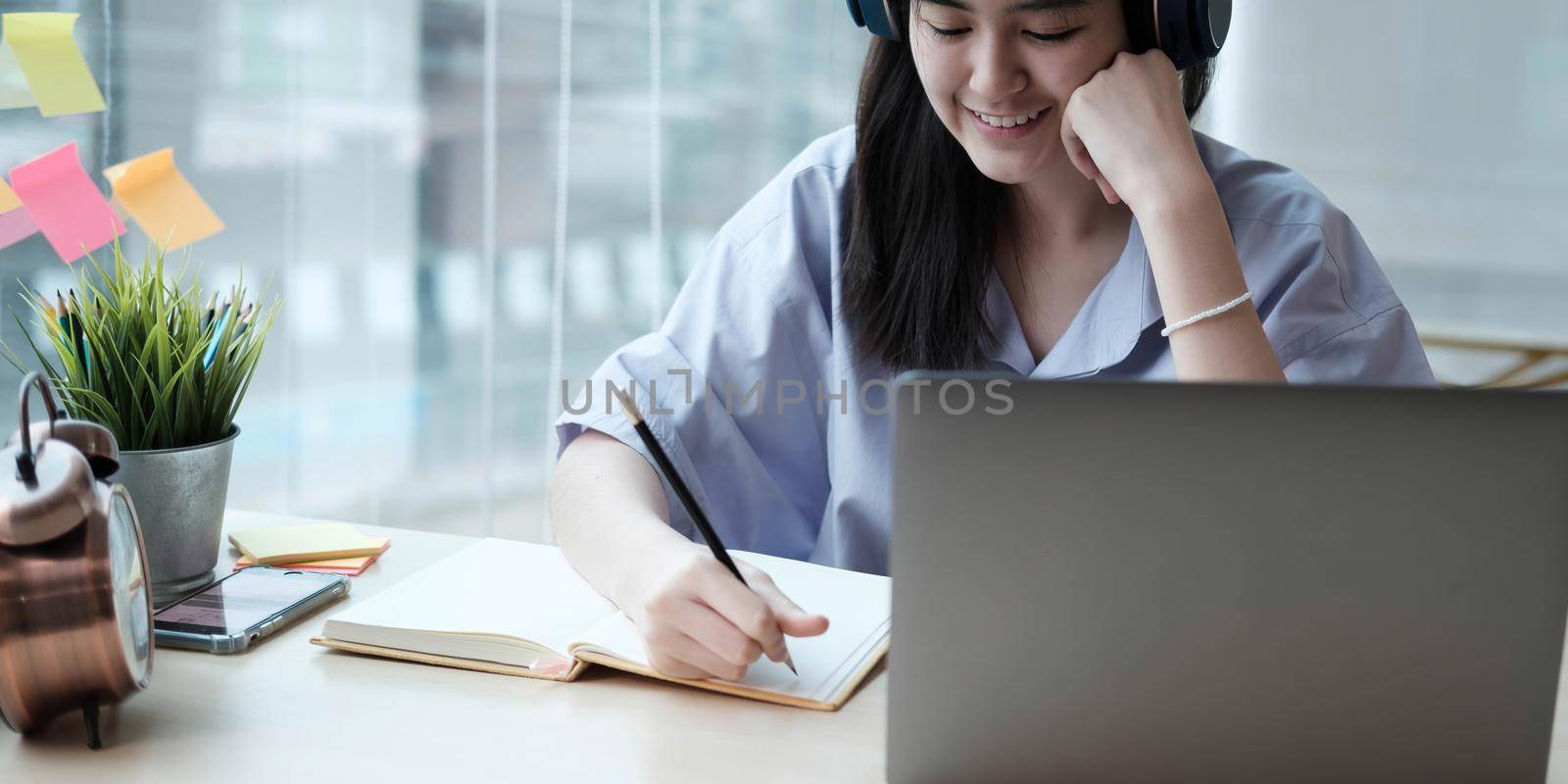 Homeschool Caucasian cute young girl student learning virtual internet online class from school teacher by remote meeting due to covid pandemic. Male teacher teaching math calculus by using whiteboard by wichayada