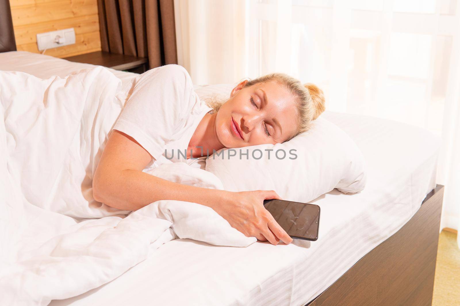 Woman beautiful blonde mobile phone sleep bed blanket view morning, for adult pillow from dream for happy nap, positive light. Face cozy pleasure, by 89167702191