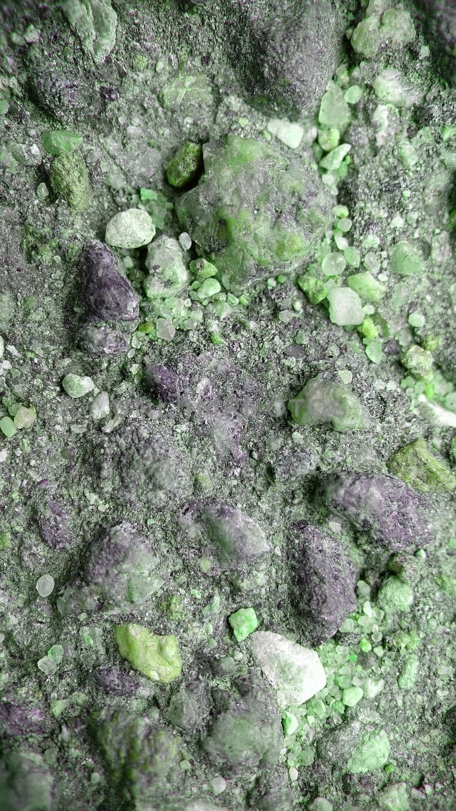 Macro. A stone with a green surface close-up.Texture or background