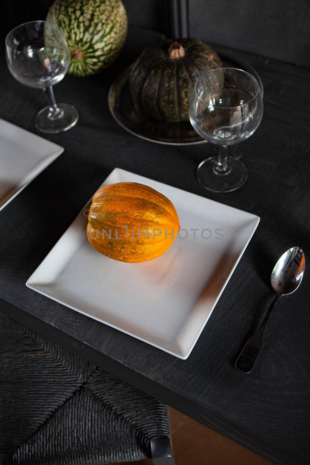 Assorted pumpkins and table set