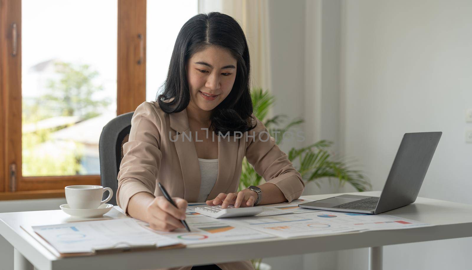 Business Woman Accountant And Bookkeeper Working Invoice And Calculator.