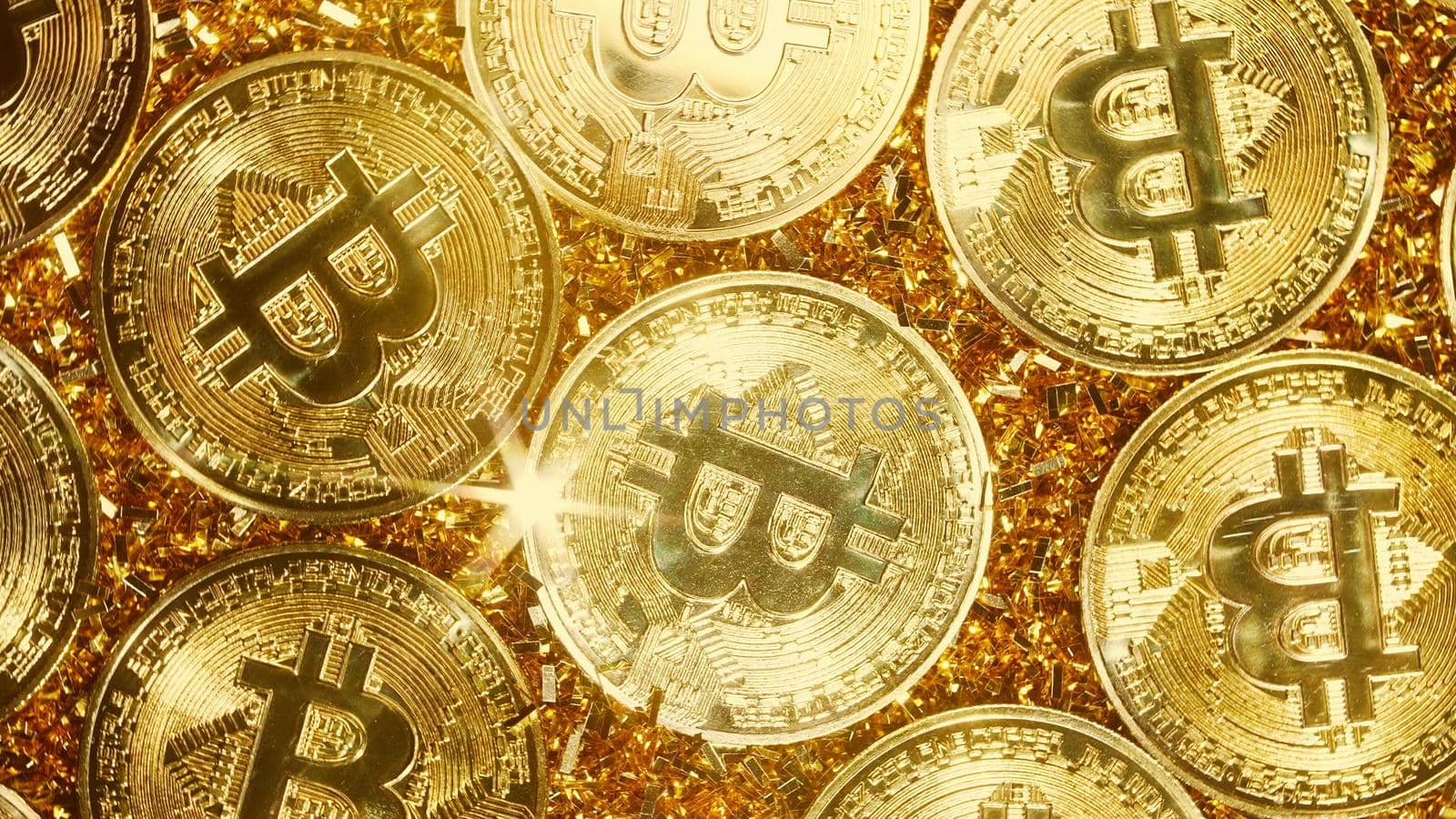 Bitcoin, crypto currency. Golden coins. Digital exchange, popularity of BTC, symbol of future money, electronics industry, mining concept. High quality photo