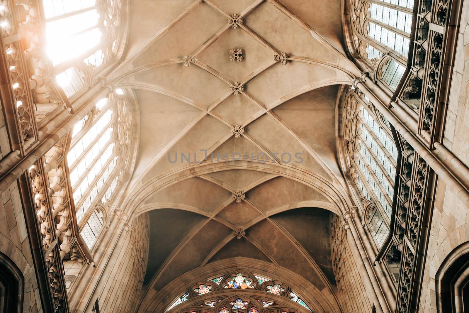 Prague, Czech Republic - July 2022. Dome in St. Vitus Cathedral. Grand interior, gothic ornamental details of roof inside. High ceiling, most famous church in Castle. . High quality photo