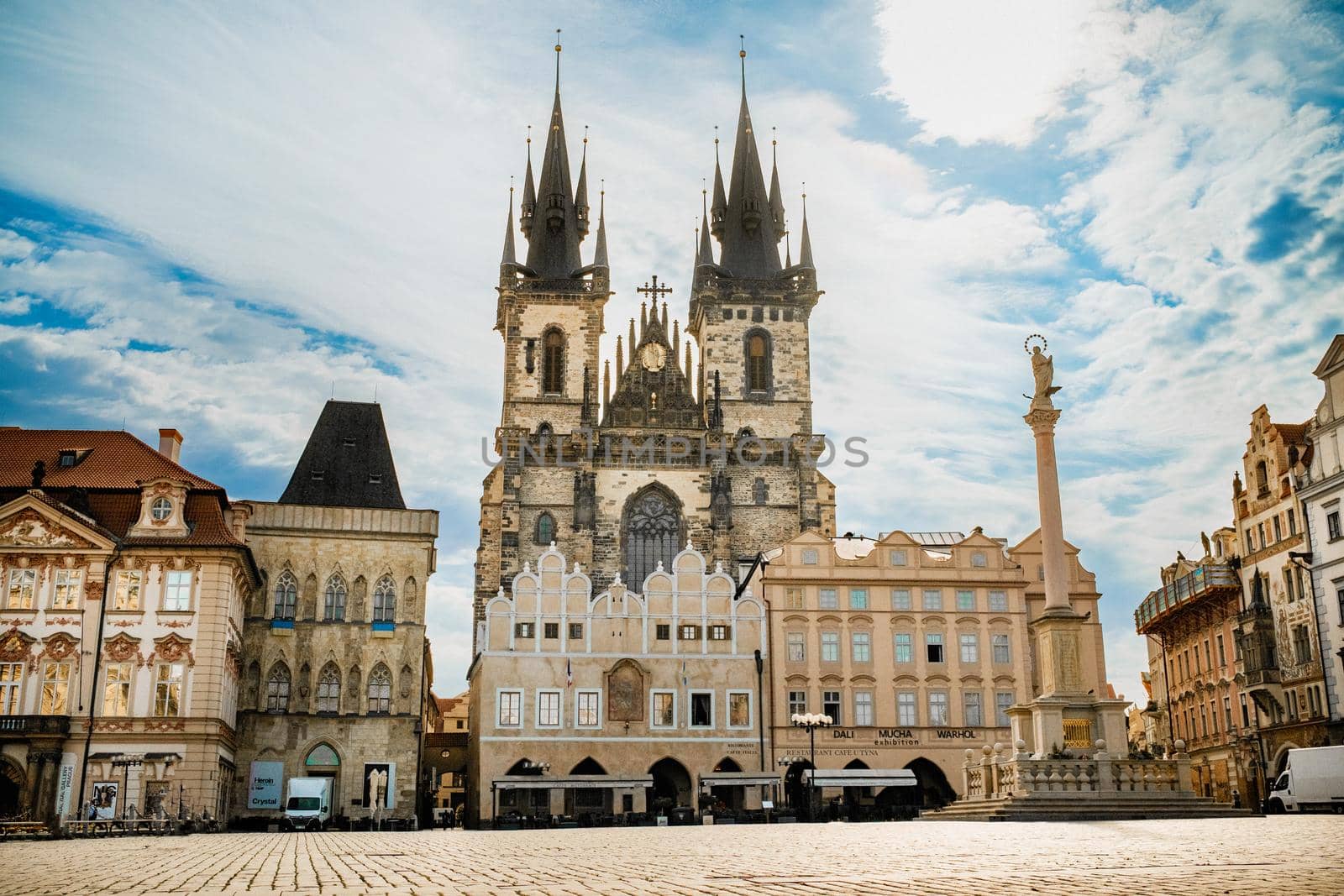 Prague, Czech Republic - July 2022. Old town square with Church of our Lady before Tyn. Famous historical, gothic style buildings. Sunny cityscape in european capital. High quality photo