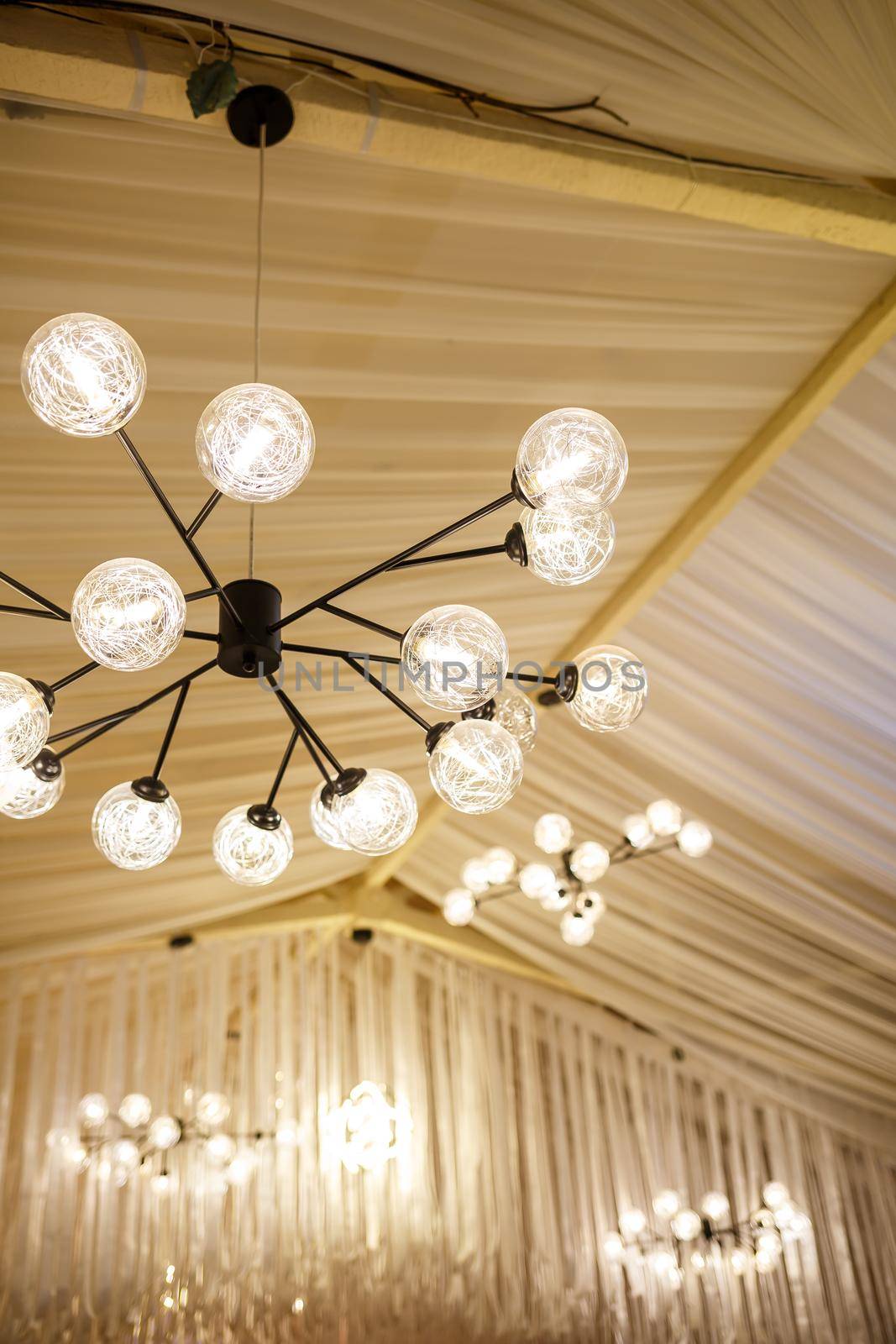 Modern loft chandelier with many shades with energy saving lamps