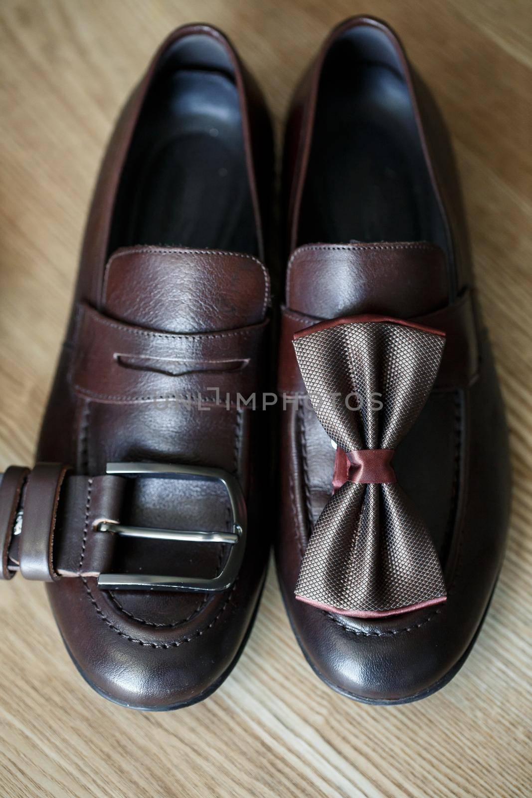 Mens elegant set of stylish groom accessories for wedding day. Men's classic shoes